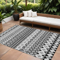 9' X 12' Black Gray And Ivory Quatrefoil Washable Indoor Outdoor Area Rug