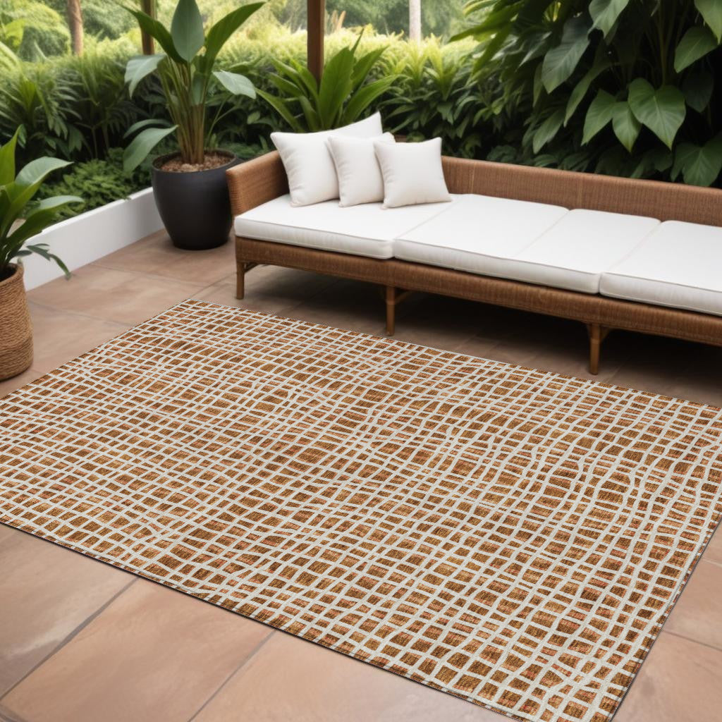 8' X 10' Orange Beige And Copper Striped Washable Indoor Outdoor Area Rug