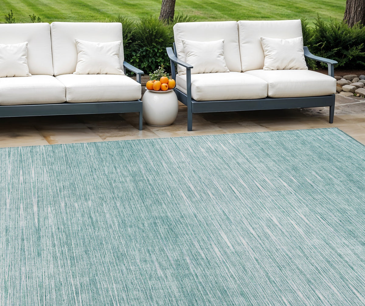 9' X 12' Aqua And Ivory Abstract Washable Indoor Outdoor Area Rug