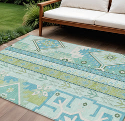 9' X 12' Mint Green Blue And Ivory Aztec Washable Indoor Outdoor Area Rug
