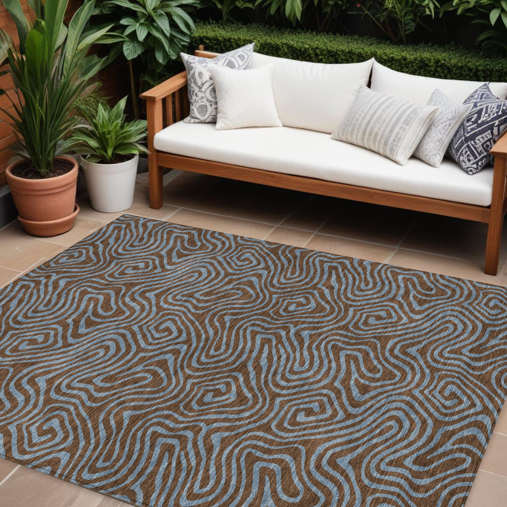 8' X 10' Brown And Light Blue Abstract Washable Indoor Outdoor Area Rug