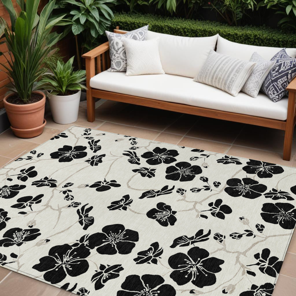 10' X 14' Ivory And Black Floral Washable Indoor Outdoor Area Rug