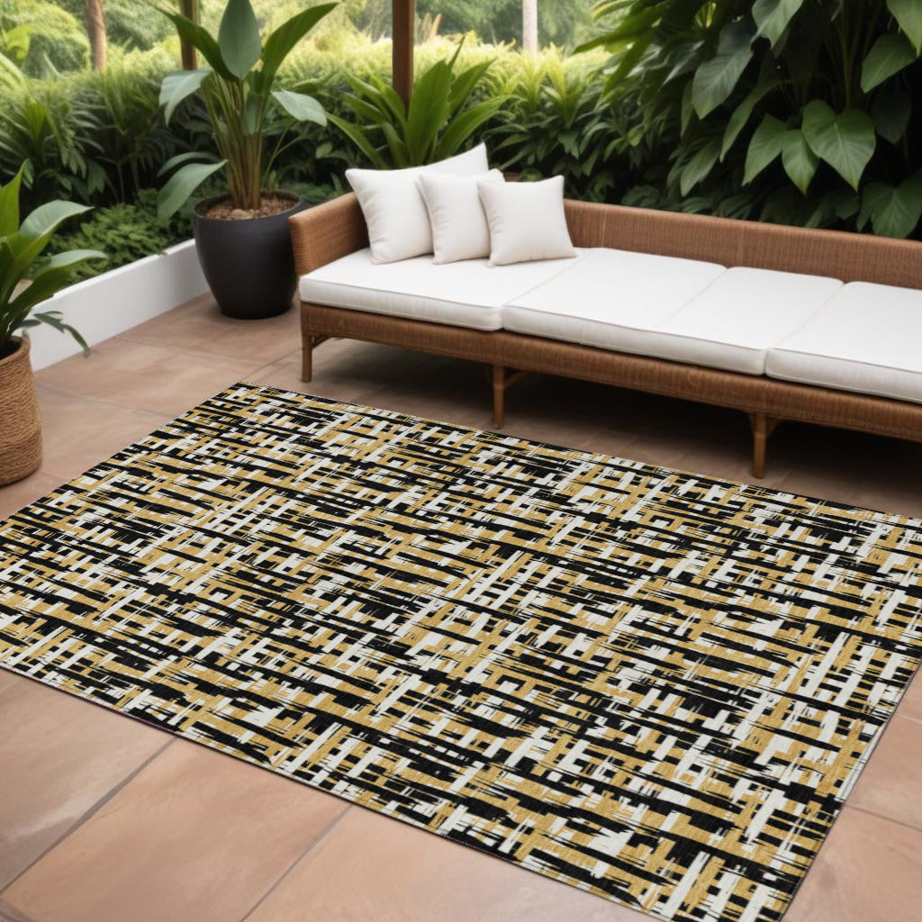 10' X 14' Black Gold And Ivory Abstract Washable Indoor Outdoor Area Rug