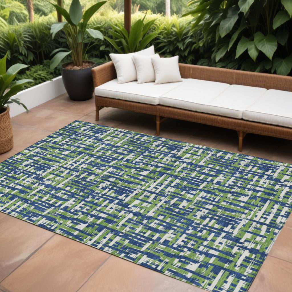 10' X 14' Navy Blue Green And Ivory Abstract Washable Indoor Outdoor Area Rug