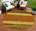 8 Terra Cotta Gold And Brown Round Abstract Washable Indoor Outdoor Area Rug