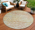 8 Peach And Ivory Round Argyle Washable Indoor Outdoor Area Rug