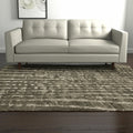 5' X 8' Green And Tan Abstract Area Rug