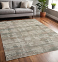 5' X 8' Ivory Gray And Green Abstract Distressed Area Rug