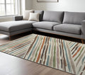 8' X 10' Ivory Brown And Blue Abstract Area Rug