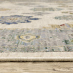 HomeRoots 509357 8 x 11 ft. Ivory Blue Gray Teal Gold Green & Rust Oriental Power Loom Stain Resistant Rectangle Area Rug with Fringe