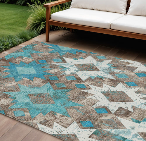 10 X 14 Teal Blue Brown And Ivory Aztec Washable Indoor Outdoor Area Rug