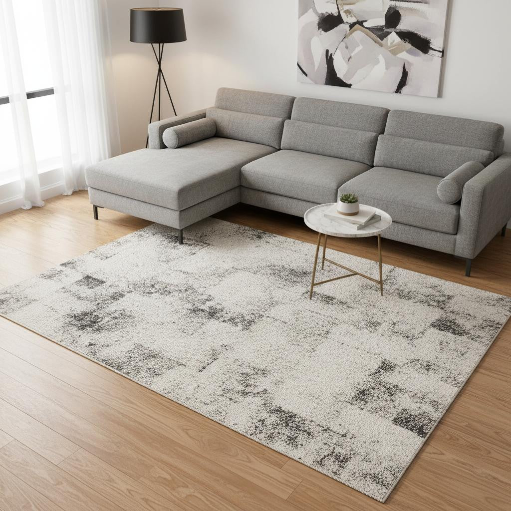 8 X 11 Cream And Black Abstract Area Rug