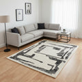 8 X 11 Beige And Black Abstract Area Rug