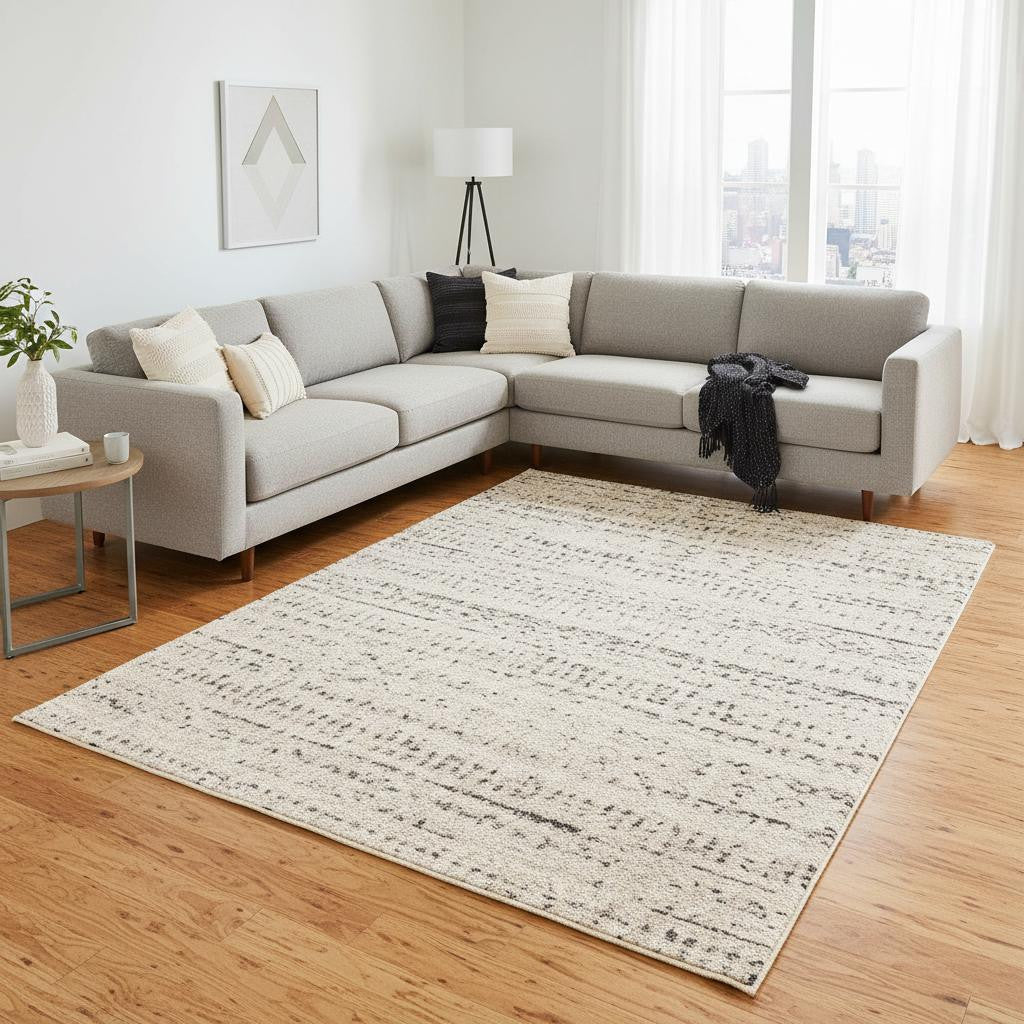 8 X 11 Cream And Brown Tribal Area Rug