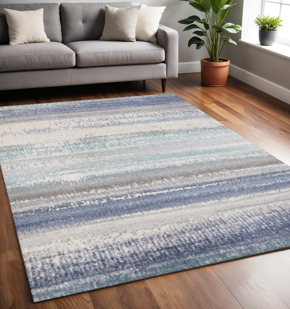 5 X 8 Blue Gray And Cream Abstract Area Rug