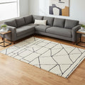 7 X 10 Cream And Black Geometric Area Rug