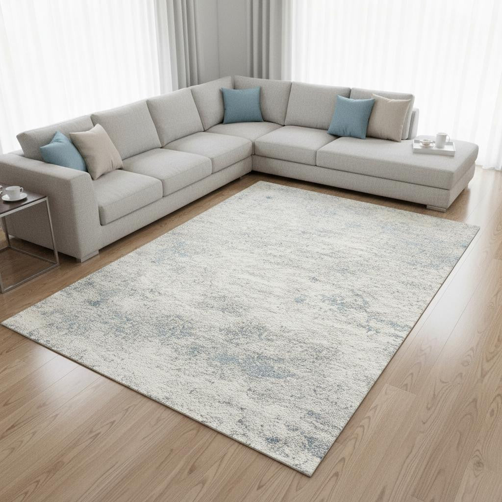 8 X 11 Cream And Blue Abstract Area Rug