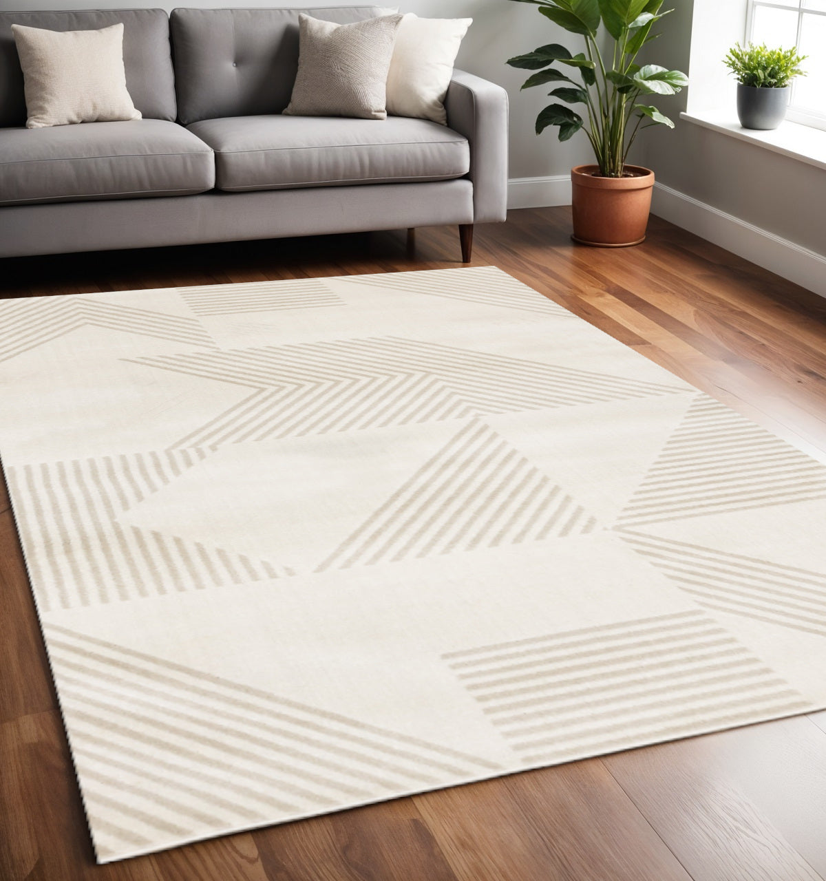 5 X 8 Cream And Beige Geometric Area Rug