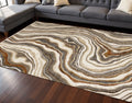 7 X 10 Cream And Beige Abstract Area Rug