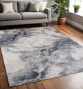 5 X 8 Blue Cream And Gray Abstract Area Rug