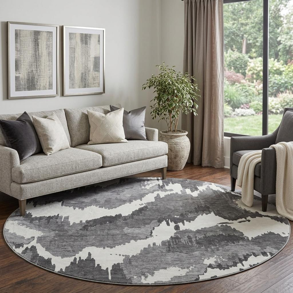 8 Black And Ivory Abstract Washable Round Rug With UV Protection