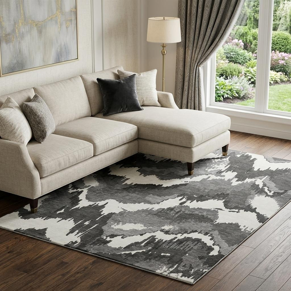 9 X 12 Black And Ivory Abstract Washable Area Rug With UV Protection