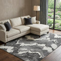 10 X 14 Black And Ivory Abstract Washable Area Rug With UV Protection