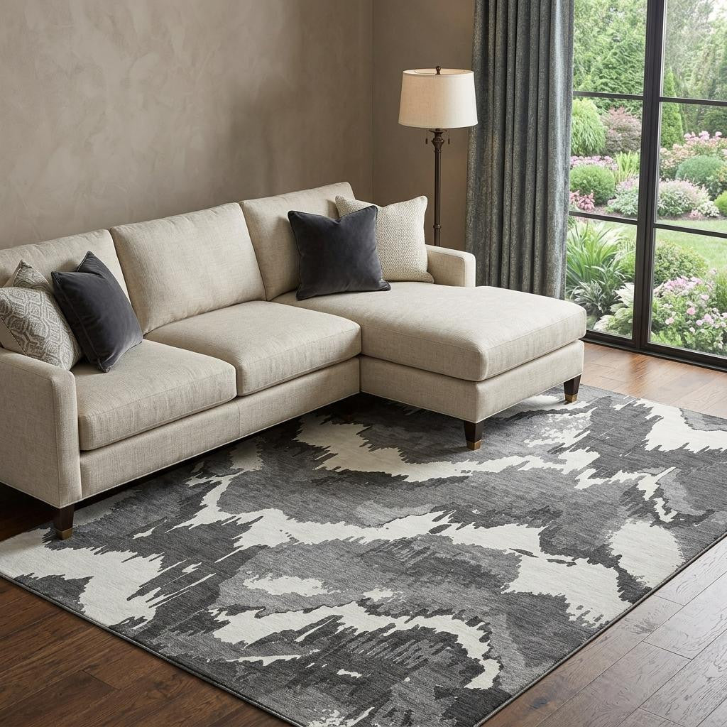 10 X 14 Black And Ivory Abstract Washable Area Rug With UV Protection