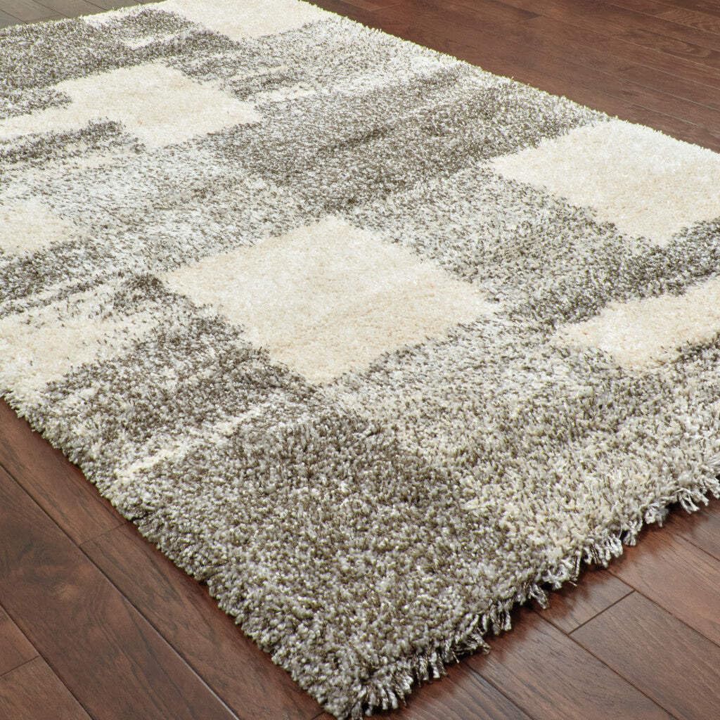 HomeRoots 507882 8 x 11 ft. Gray Ivory & Silver Geometric Shag Power Loom Stain Resistant Rectangle Area Rug
