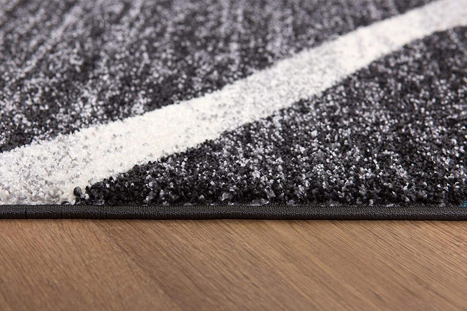 HomeRoots Grey 100% Twisted Polyester 4â€ x 6â€ Distressed Black and Gray Abstract Area Rug