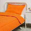 Amazon Basics 2 Piece Microfiber Kids Comforter and Pillow Sham Set, Toddler, Bright Orange, Solid