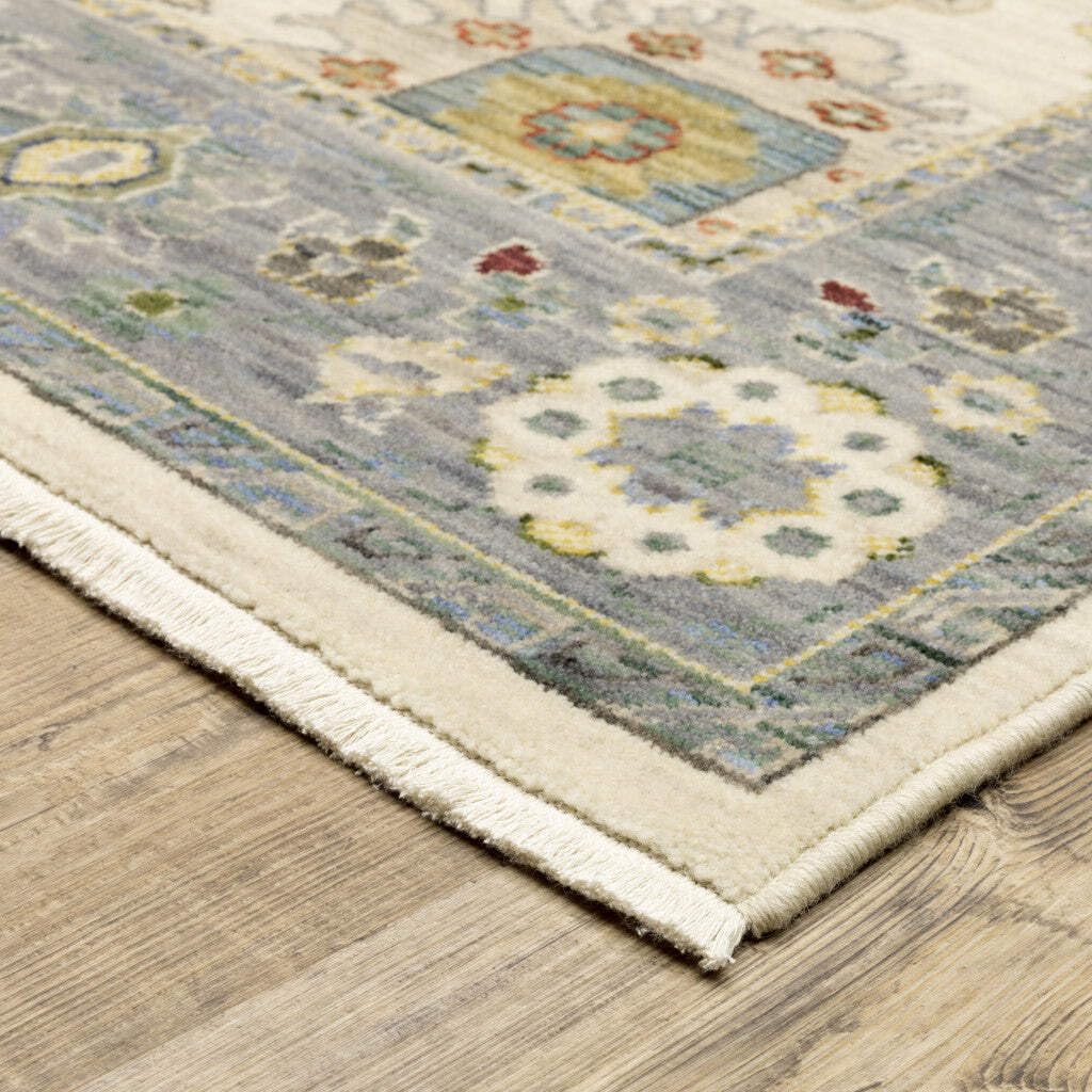 HomeRoots 509357 8 x 11 ft. Ivory Blue Gray Teal Gold Green & Rust Oriental Power Loom Stain Resistant Rectangle Area Rug with Fringe