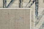 HomeRoots Ivory Heat-Set Polypropelene 3’ x 5’ Beige Blue Distressed Chevron Area Rug