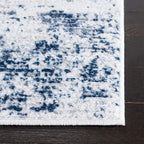 Safavieh Amelia Collection Area Rug - 8' X 10', Ivory & Navy, Modern Abstract Design, Non-Shedding & Easy Care, Ideal For High T