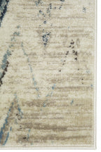 HomeRoots Ivory Heat-Set Polypropelene 3’ x 5’ Beige Blue Distressed Chevron Area Rug