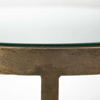 HomeRoots Antiqued Gold Glass; Metal Round Glass Top Metal Side Table with Marble Shelf on Bottom