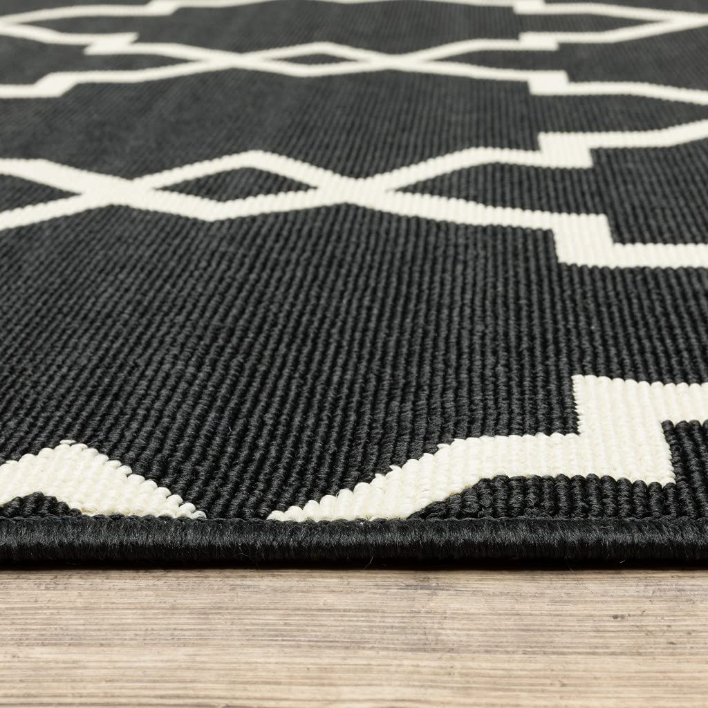 HomeRoots Polypropylene 2’x8’ Black and Ivory Trellis Indoor Outdoor Runner Rug