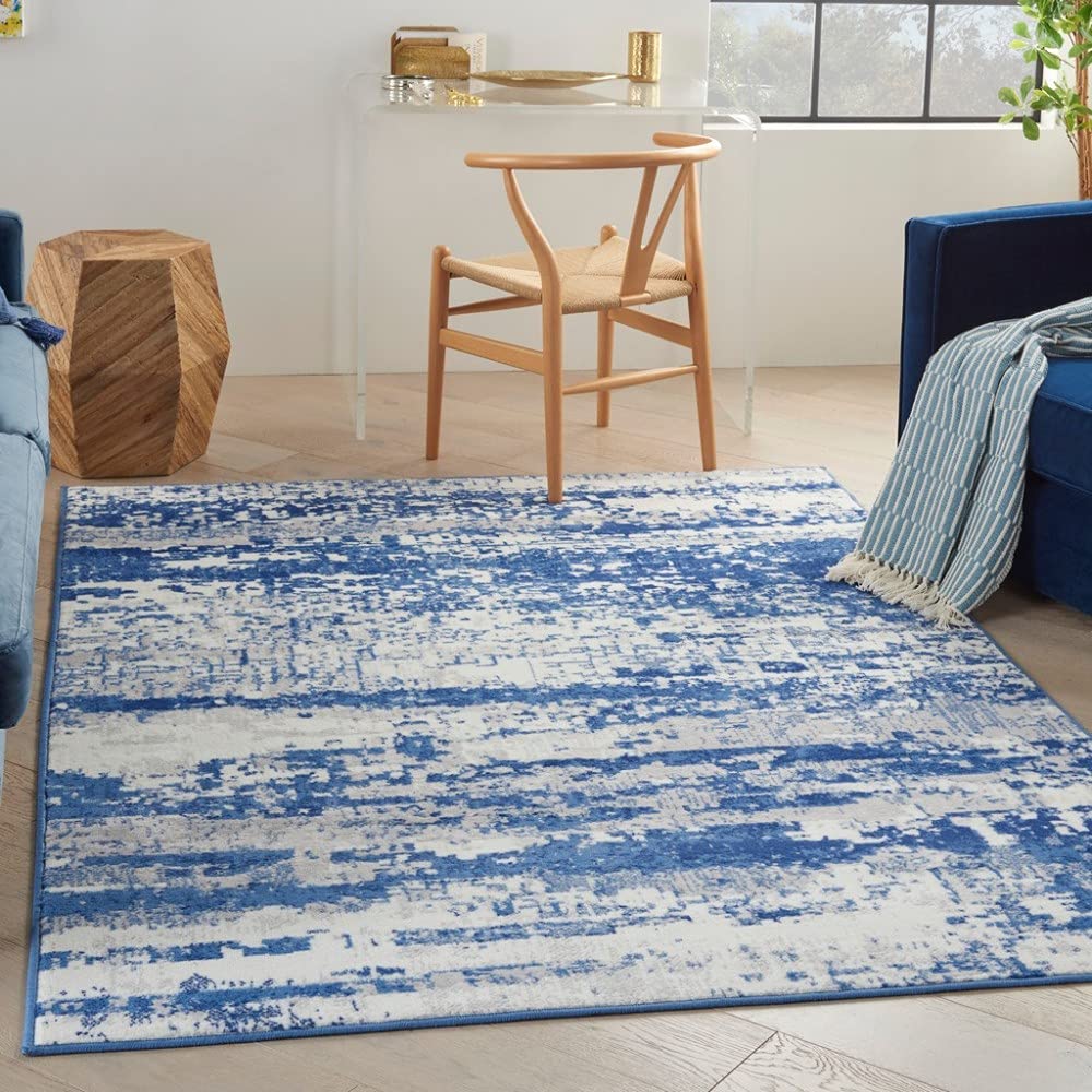 HomeRoots Ivory Navy 100% Polypropylene 5’ x 7’ Ivory and Navy Oceanic Area Rug