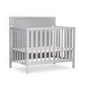 Dream On Me Bellport 4 in 1 Convertible Mini/Portable Crib in Pebble Grey, Non-Toxic Finish, Made of Sustainable New Zealand Pin