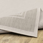 HomeRoots Polypropylene 8’x10’ Ivory and Gray Bordered Indoor Outdoor Area Rug