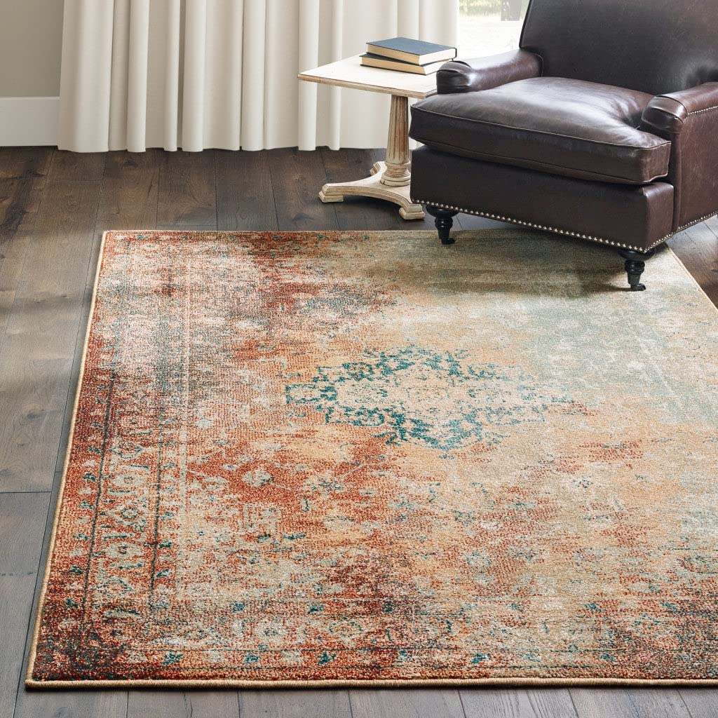 HomeRoots Rust Polypropylene 4’ x 6’ Brown and Gold Medallion Indoor Area Rug