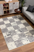 HomeRoots 100% Twisted Polyester 7â€ x 9â€ White and Gray Checkered Area Rug