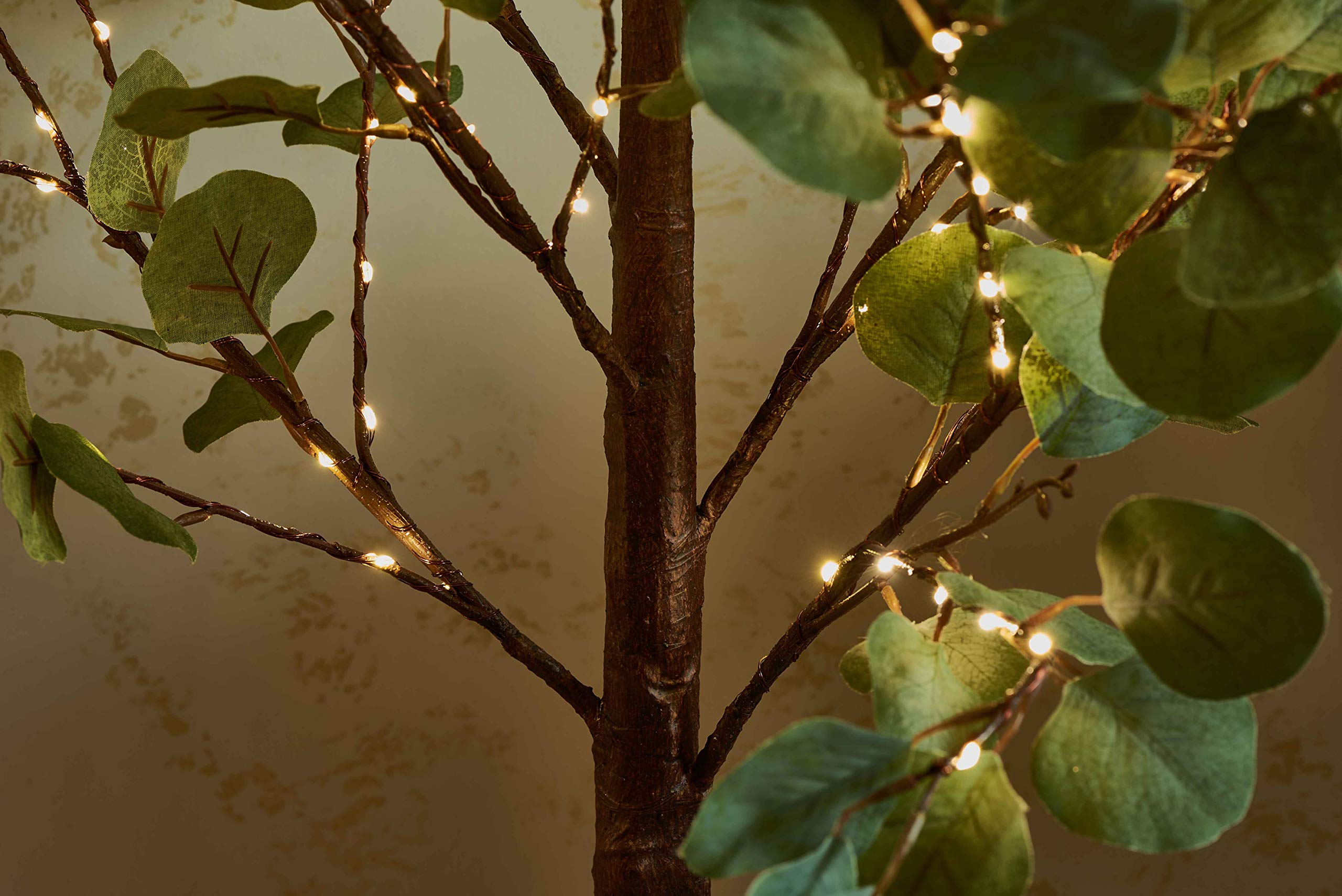 Hairui Lighted Eucalyptus Tree Plug In 4Ft 160 Warm White Led Artificial Greenery Tree With Lights For Wedding Halloween Christm