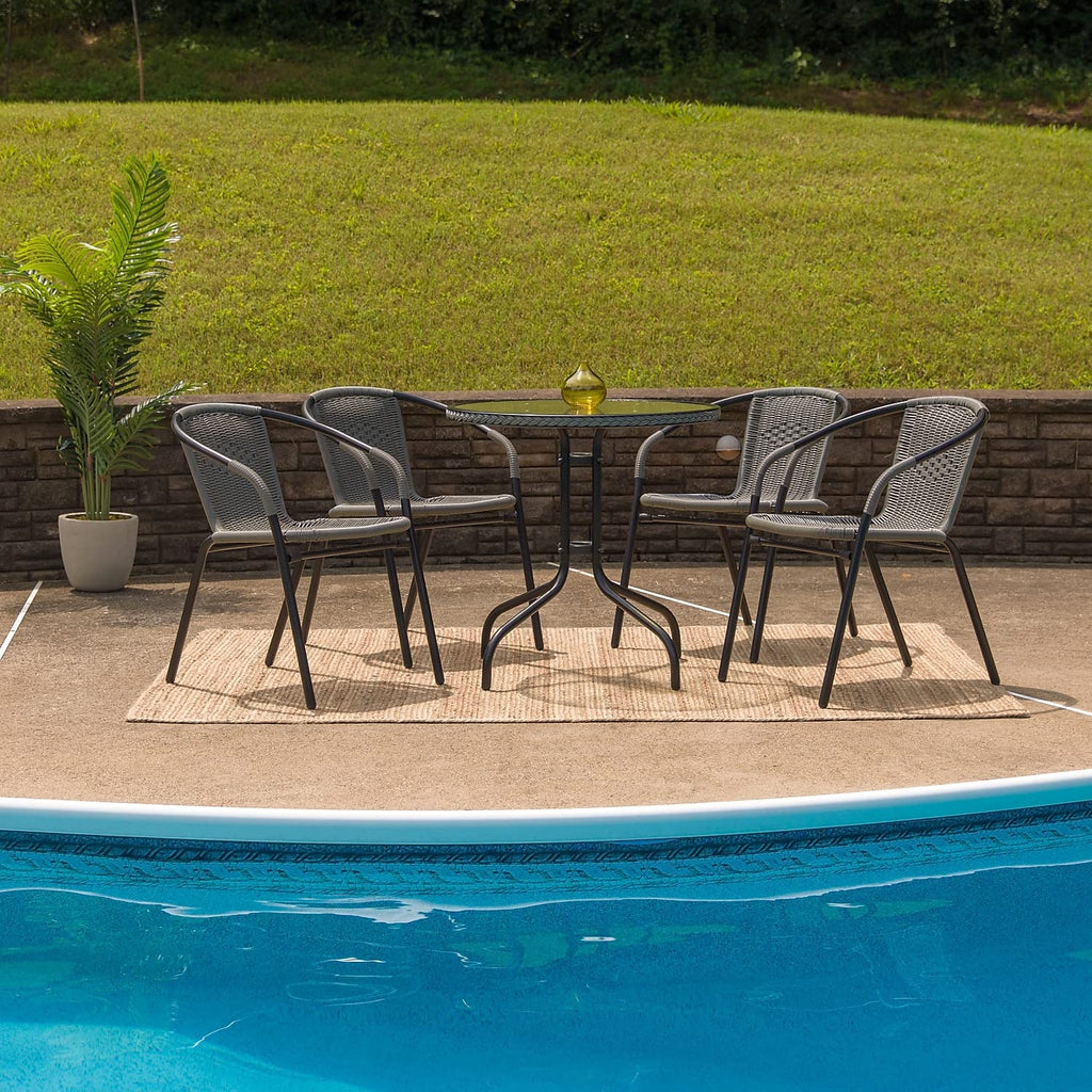 Flash Furniture Lila 28'' Round Glass Metal Table with Gray Rattan Edging and 4 Gray Rattan Stack Chairs