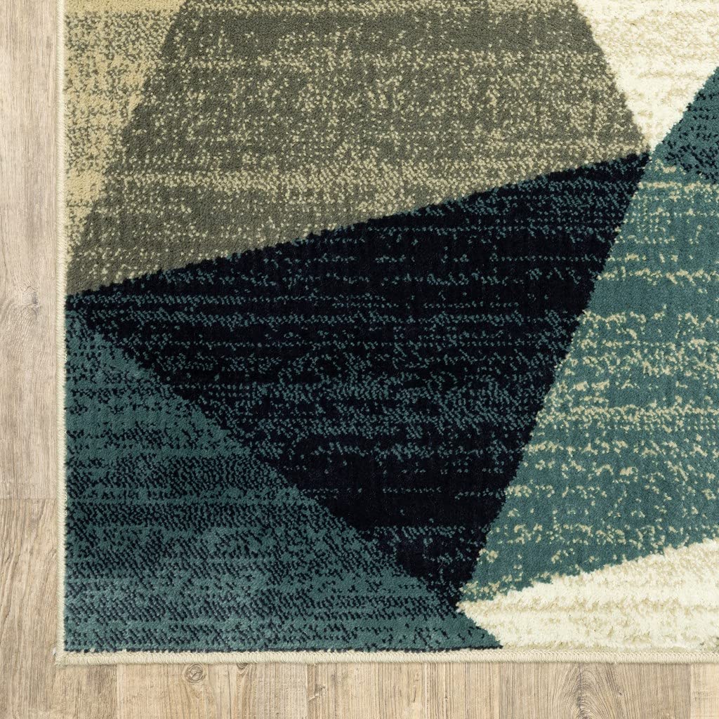 HomeRoots Grey Polypropylene 7’ x 9’ Gray and Teal Geometrics Indoor Area Rug