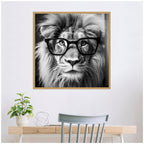 Sylvie Black and White Lion in Reading Glasses Framed Canvas by The Creative Bunch Studio