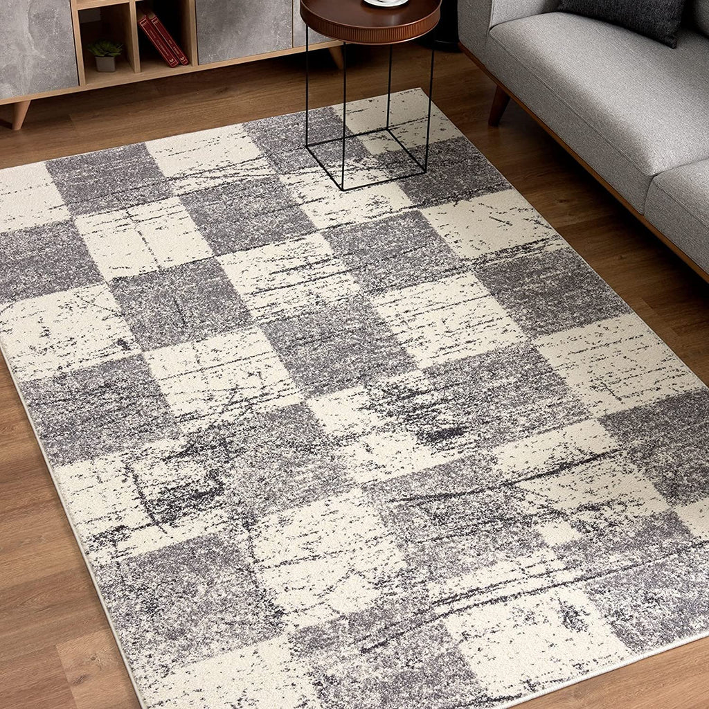 HomeRoots 100% Twisted Polyester 7â€ x 9â€ White and Gray Checkered Area Rug
