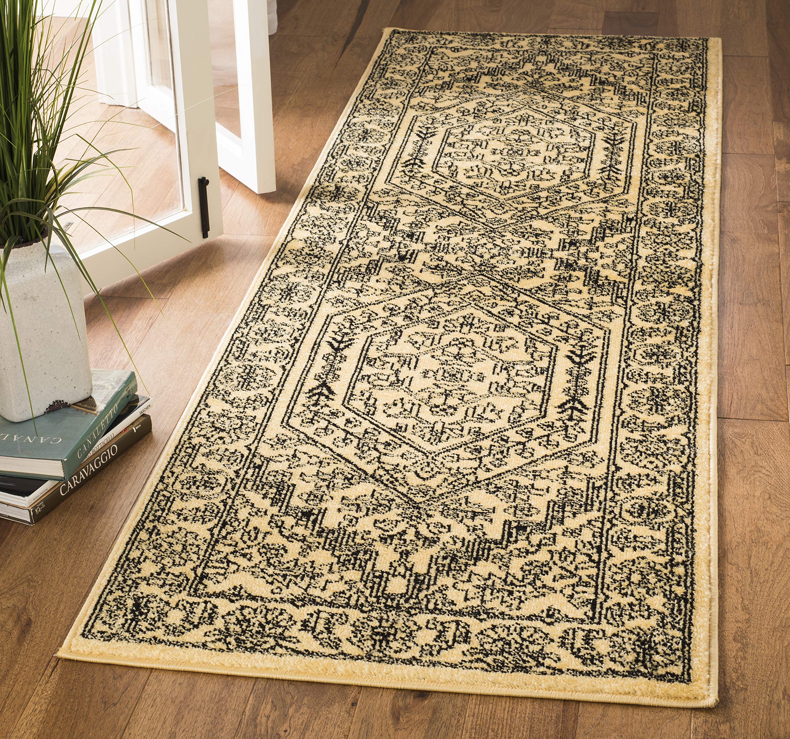 SAFAVIEH Adirondack Collection Runner Rug - 26 x 10, Gold & Black, Oriental Medallion Design, Non-Shedding & Easy Care, Ideal 