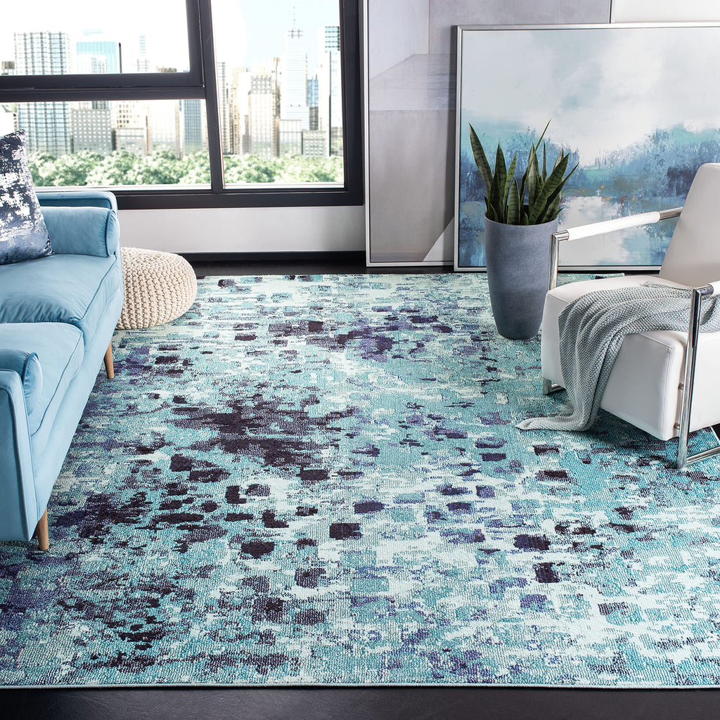 SAFAVIEH Madison Collection Area Rug - 9' x 12', Turquoise & Navy, Boho Abstract Distressed Design, Non-Shedding & Easy Care, Id