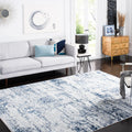 SAFAVIEH Amelia Collection Area Rug - 9' x 12', Ivory & Navy, Modern Abstract Design, Non-Shedding & Easy Care, Ideal for High T